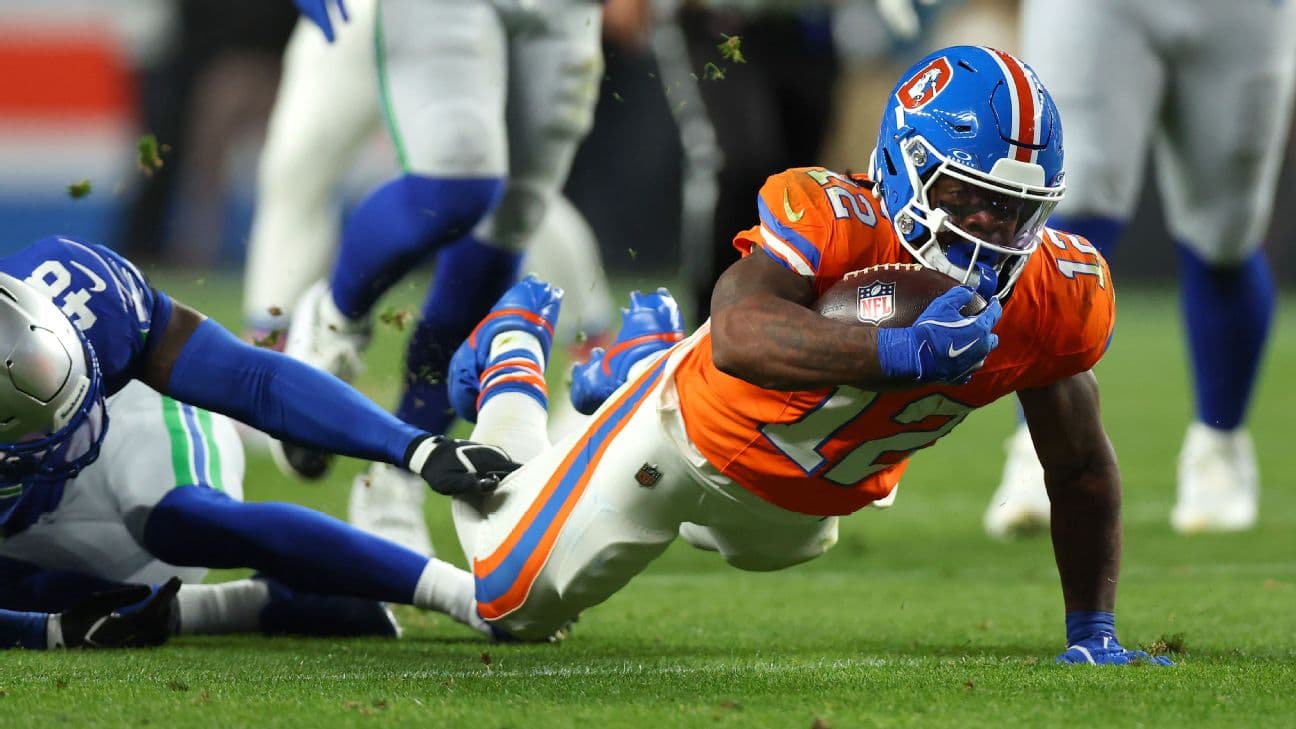 RJ Harvey dives for a first down.